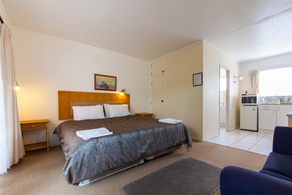 Sunset Lodge Motel Taupaki Habitación foto