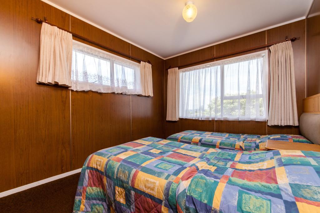 Sunset Lodge Motel Taupaki Habitación foto