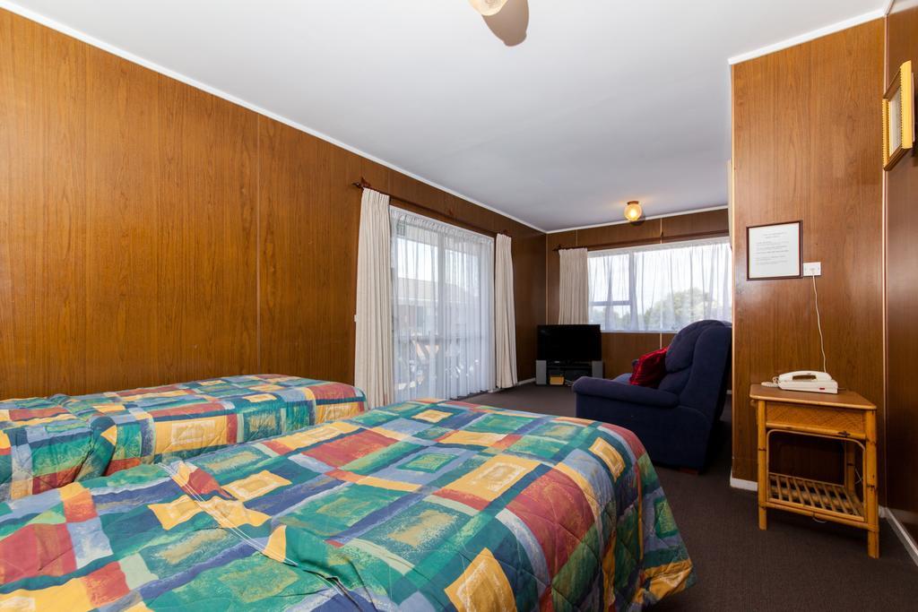 Sunset Lodge Motel Taupaki Habitación foto