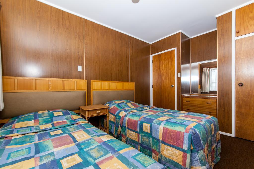 Sunset Lodge Motel Taupaki Habitación foto